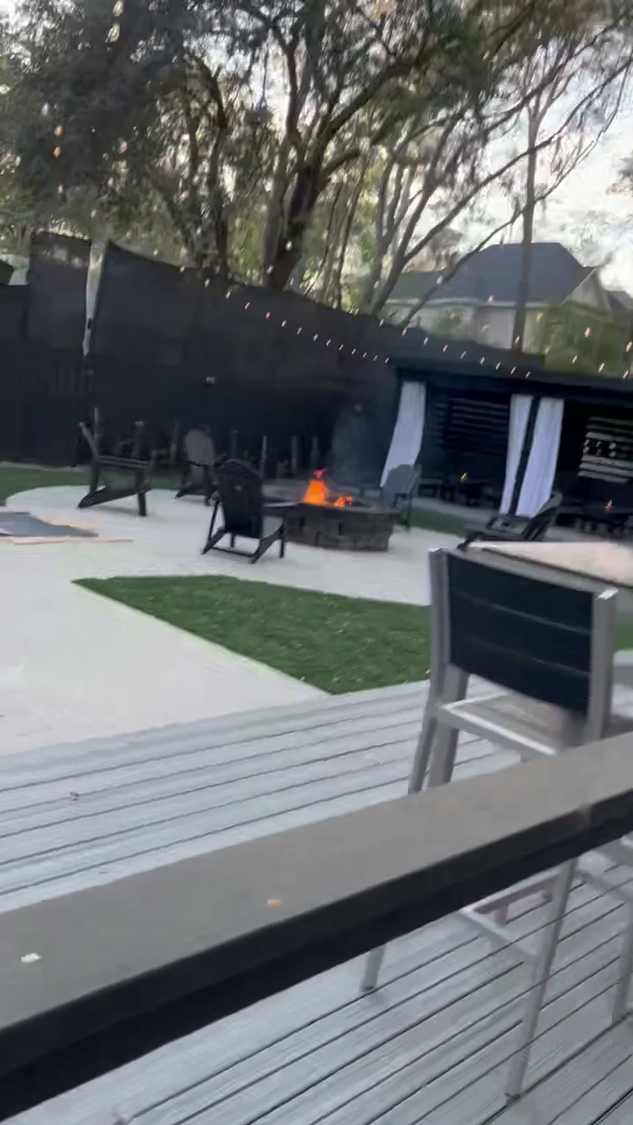 Fire pit and outdoor cabana lounge at Good Soul Southern Kitchen